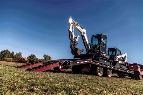 ram 5500 towing bobcat mini excavator|How to Tow a Bobcat Skid.